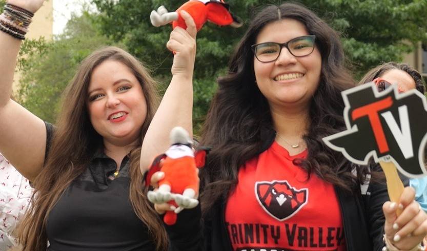 Trinity Valley Community College student and employees showing their cardinal pride
