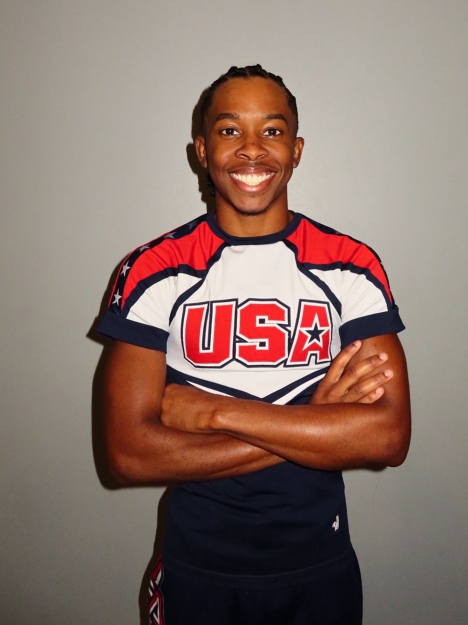 Asa Ware posing in Team USA cheer uniform